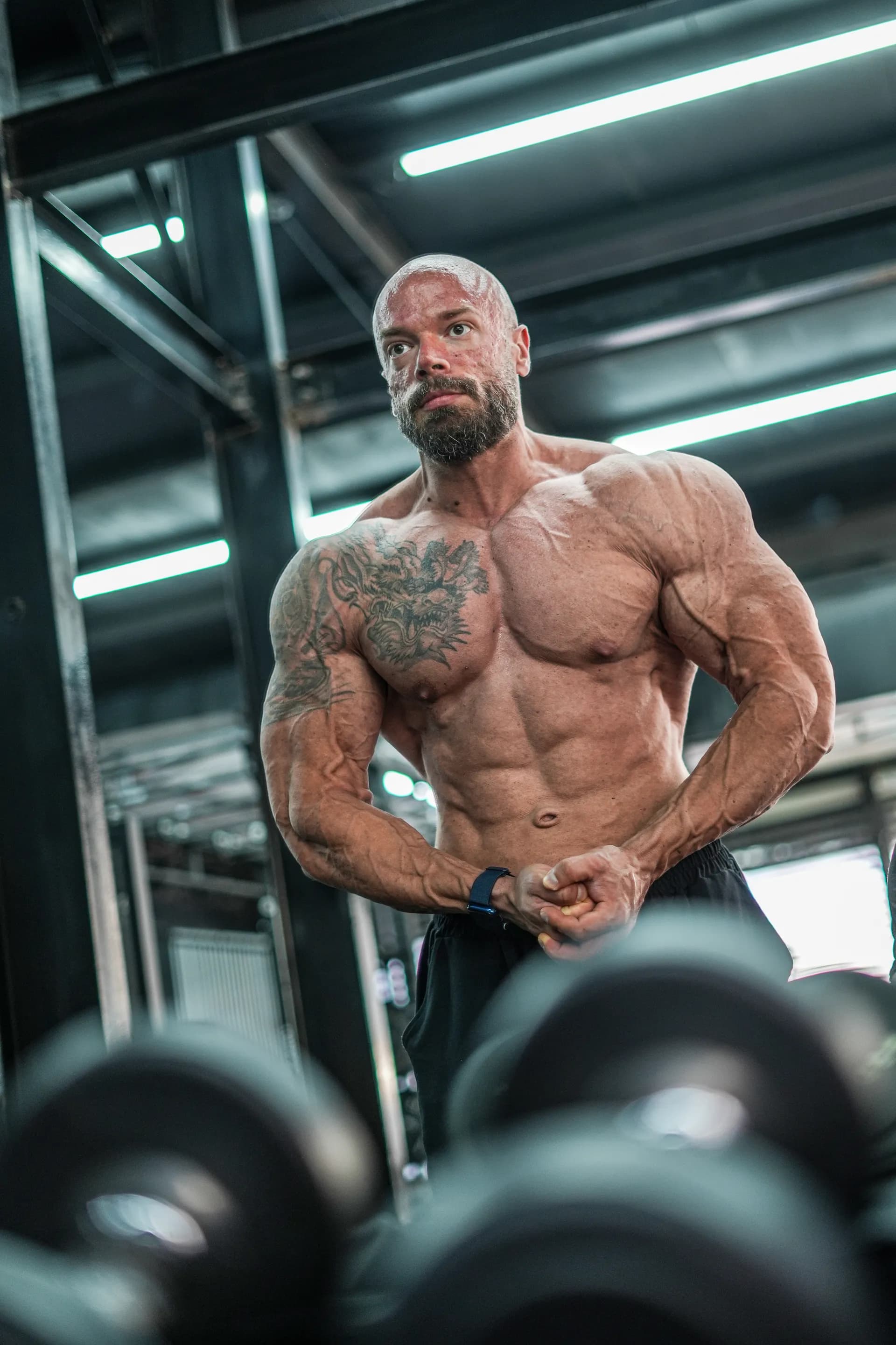 Coach Mirza in a Dubai gym setting, ready for a training session